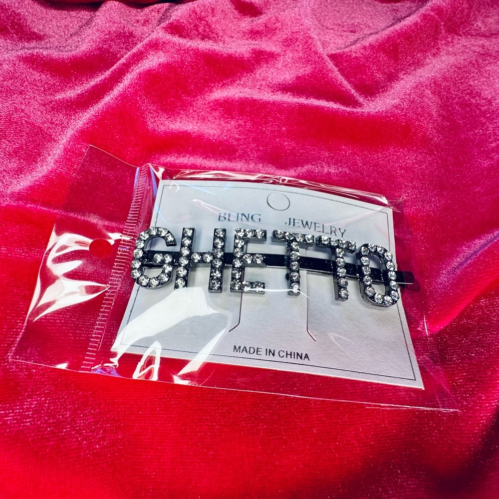 “GHETTO” rhinestone hair clip from TIGRIS NEW YORK.